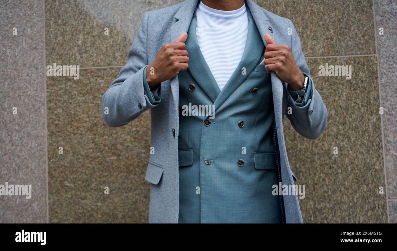 Mid section of man in business attire Stock Photo
