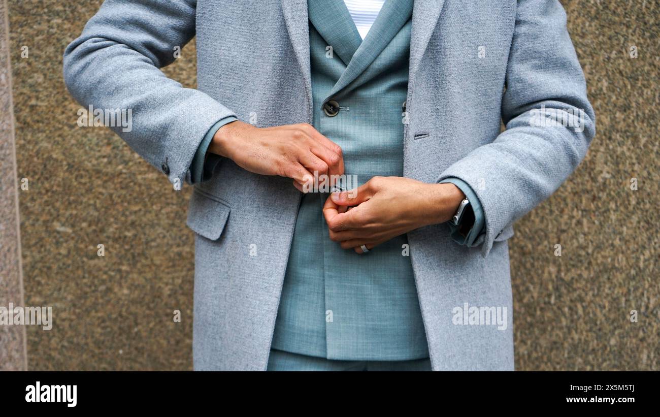 Mid section of man in business attire Stock Photo