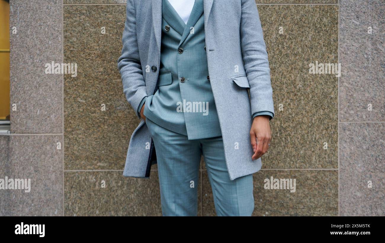 Mid section of man in business attire Stock Photo