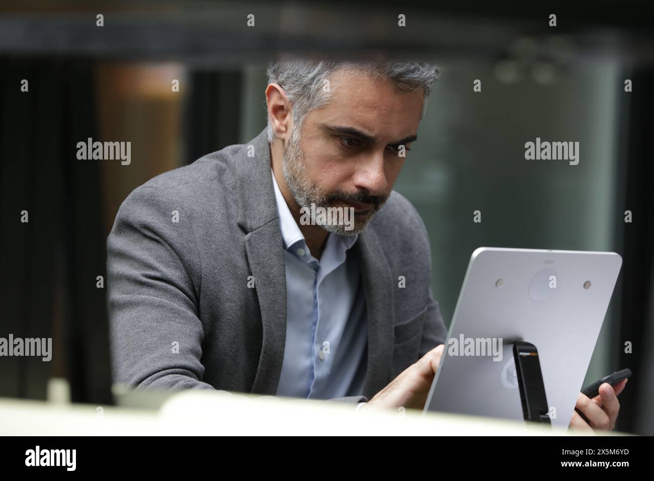 Businessman using digital tablet Stock Photo