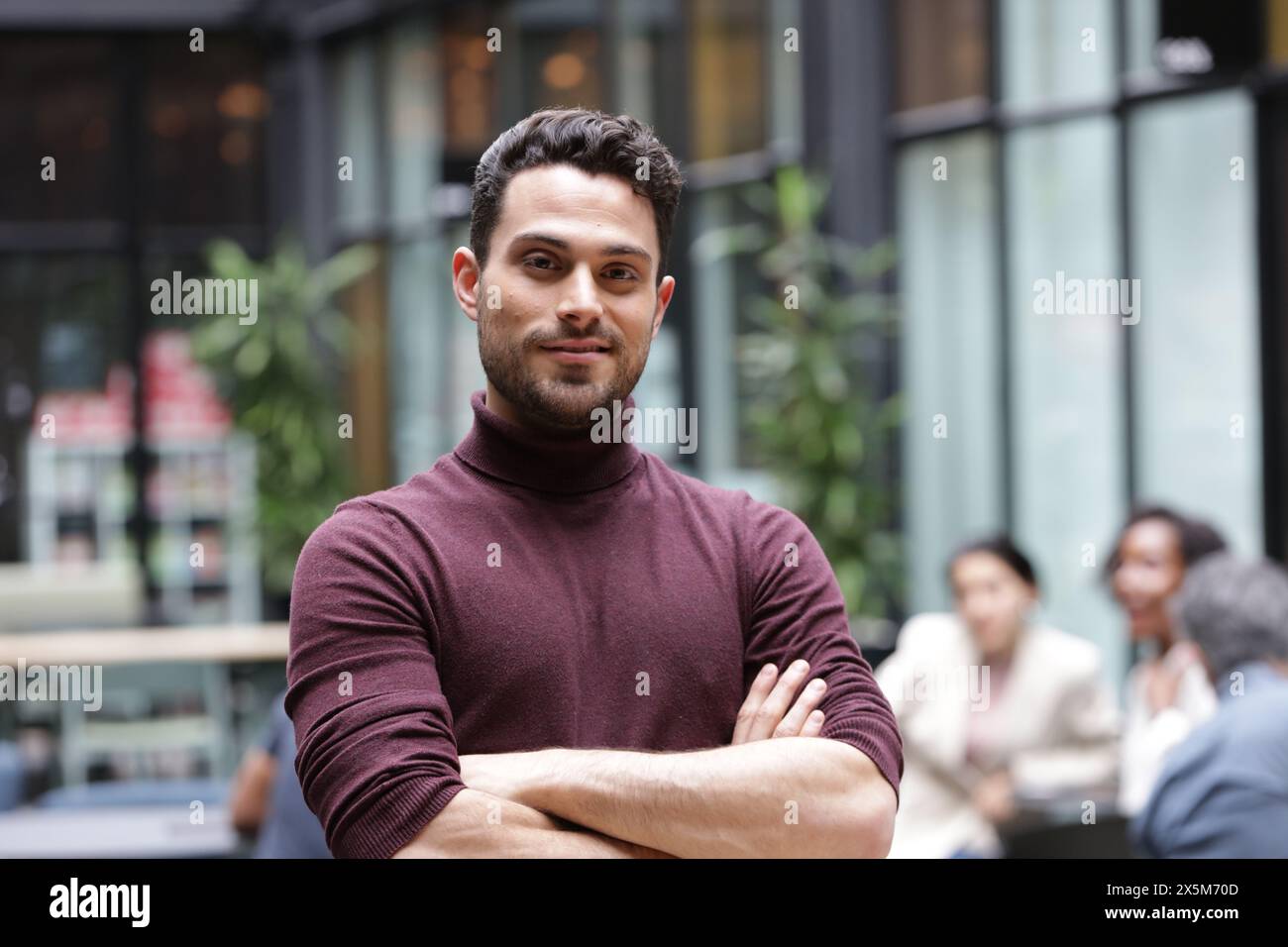 Portrait of young businessman in office Stock Photo