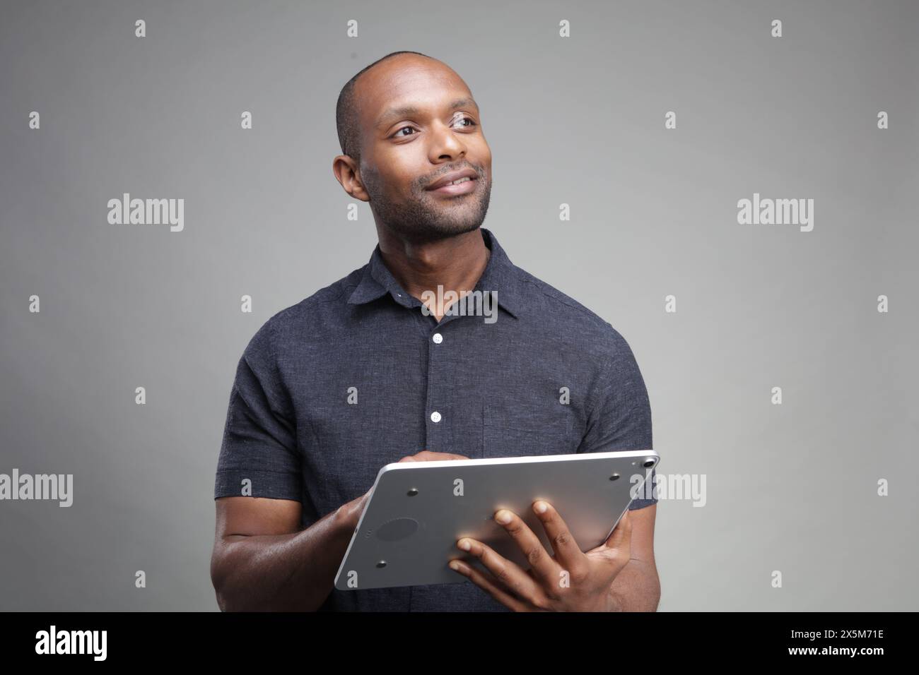 Businessman using digital tablet Stock Photo