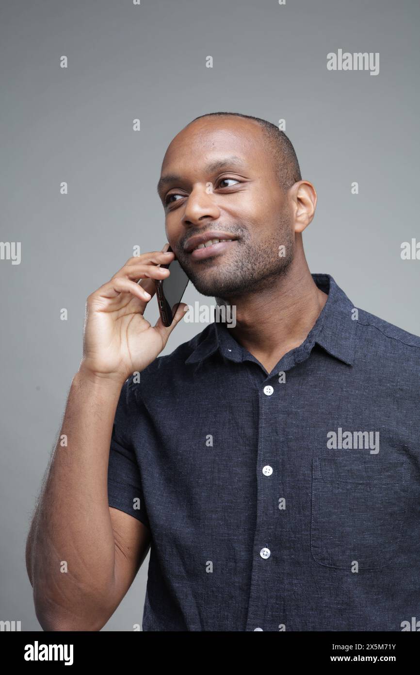 Businessman talking on phone Stock Photo