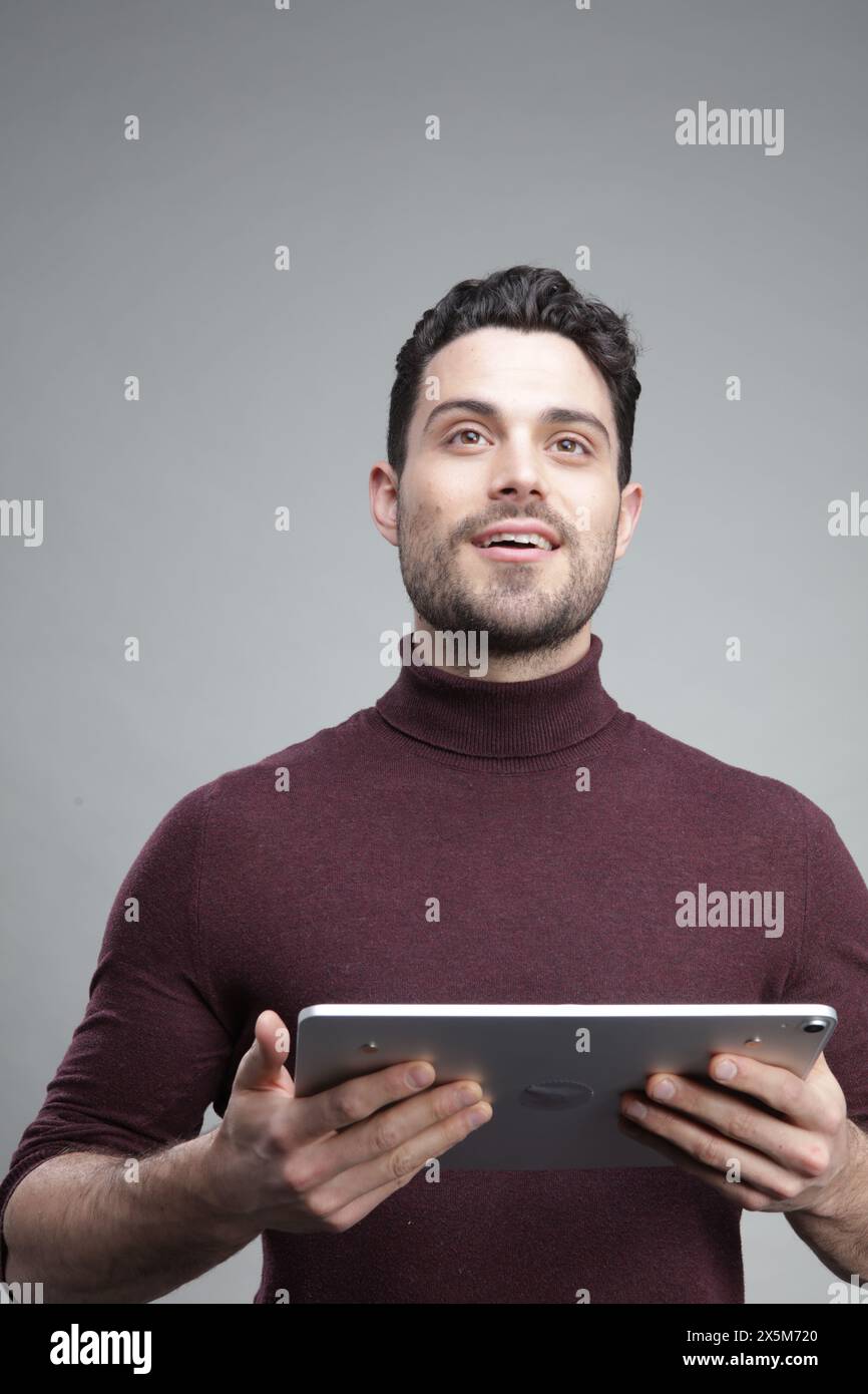 Young businessman using digital tablet Stock Photo