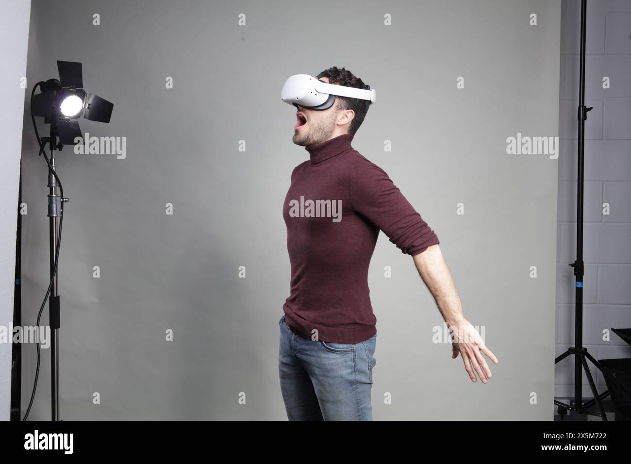 Young man using virtual reality headset Stock Photo