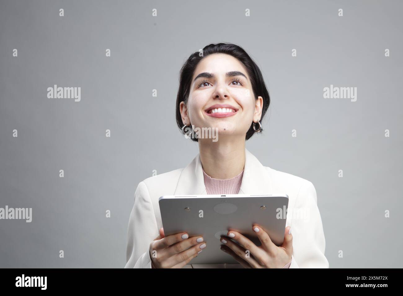 Young businesswoman using tablet Stock Photo