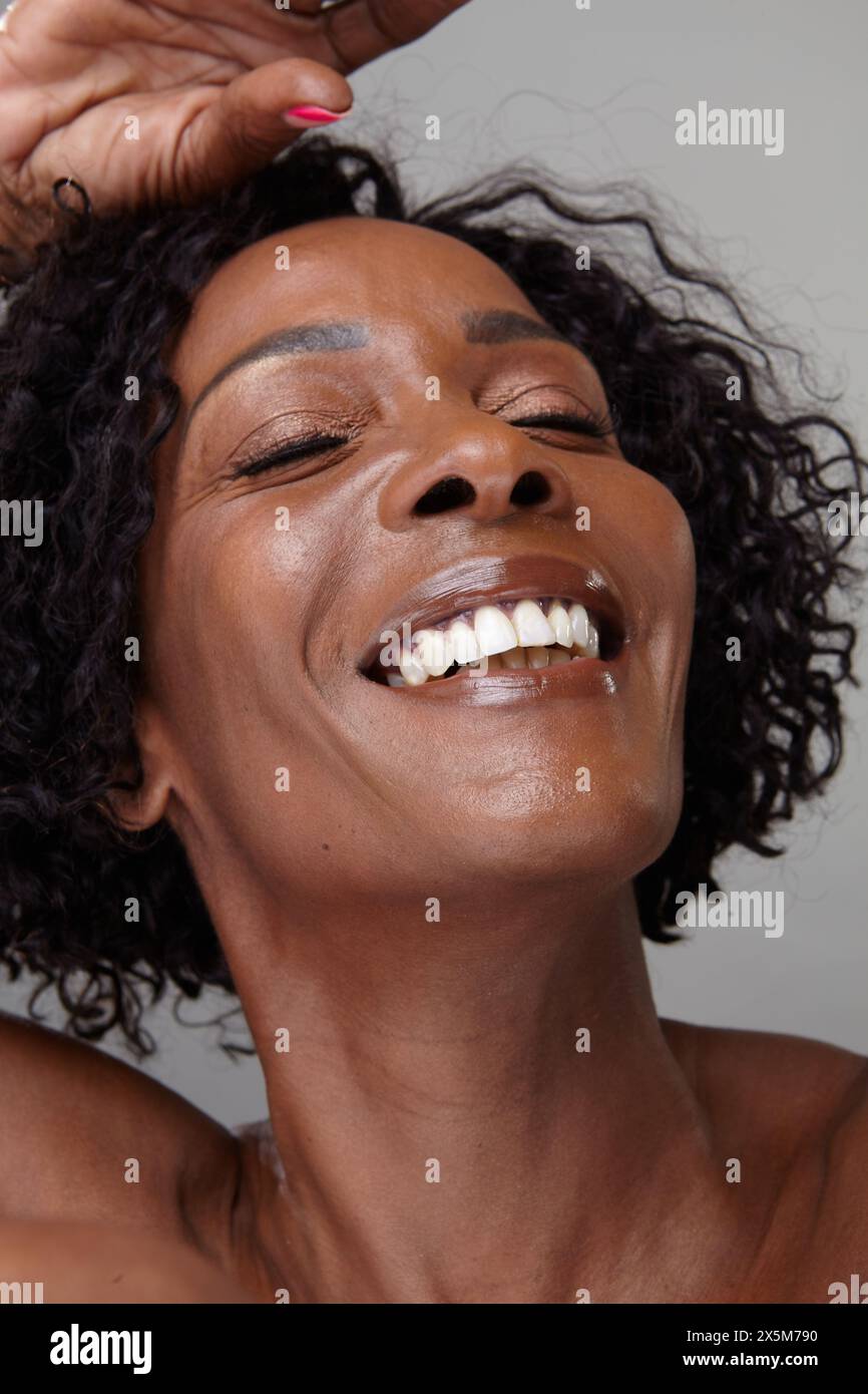 Vertical shot mature woman hi-res stock photography and images - Alamy