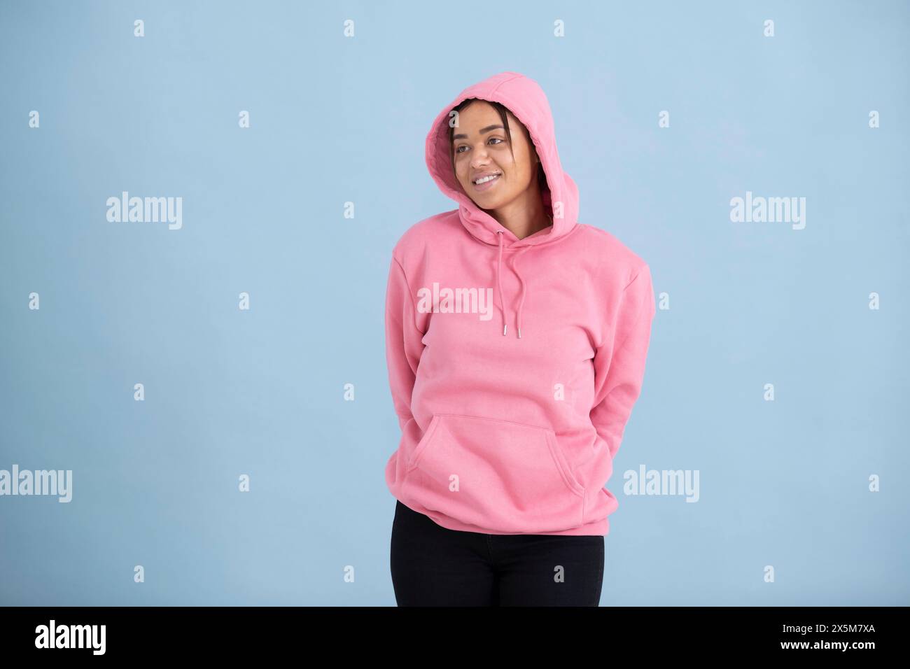 Person wearing blue hoodie hi-res stock photography and images - Alamy