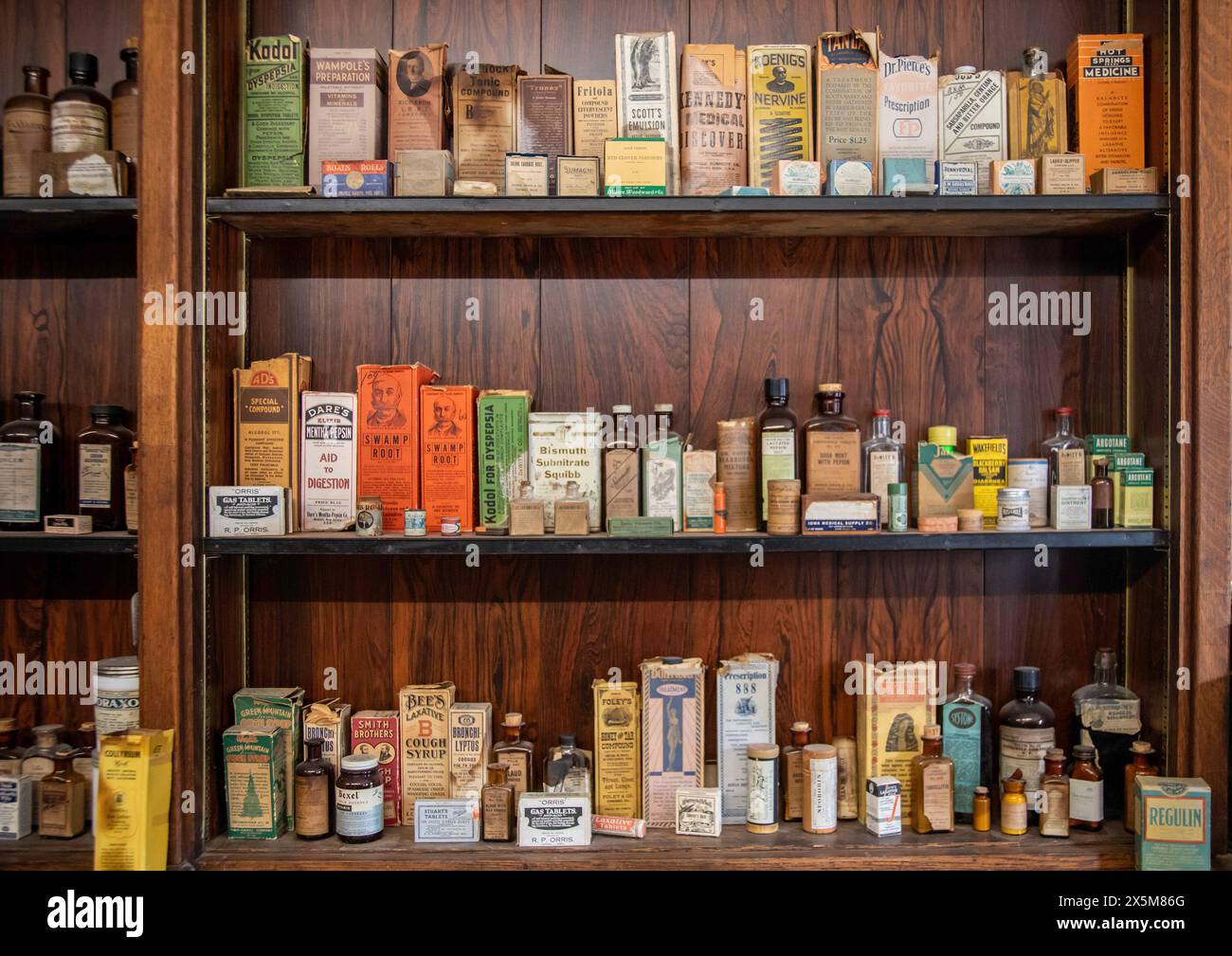 Fort Dodge, Iowa - Medicines on the shelves of Schwarz Drug Store at the Fort Museum and Frontier Village. Operated by the Fort Dodge Historical Found Stock Photo