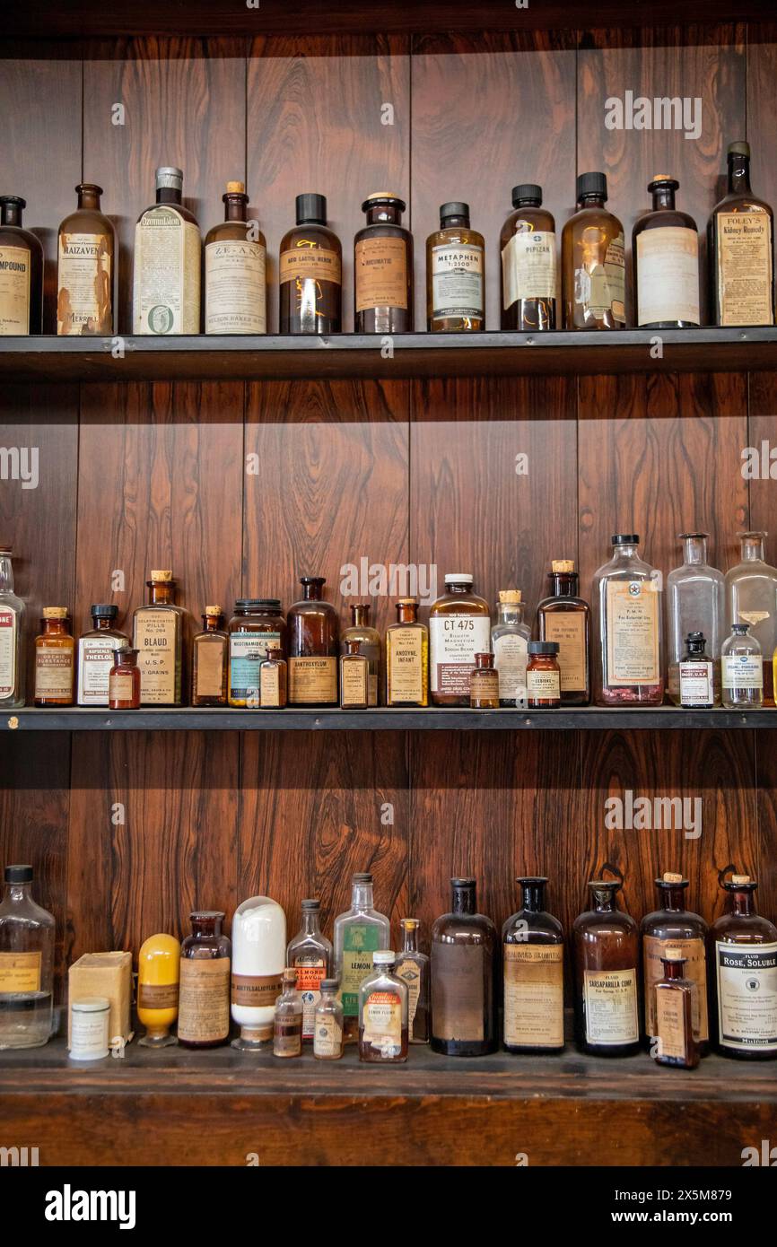 Fort Dodge, Iowa - Medicines on the shelves of Schwarz Drug Store at the Fort Museum and Frontier Village. Operated by the Fort Dodge Historical Found Stock Photo