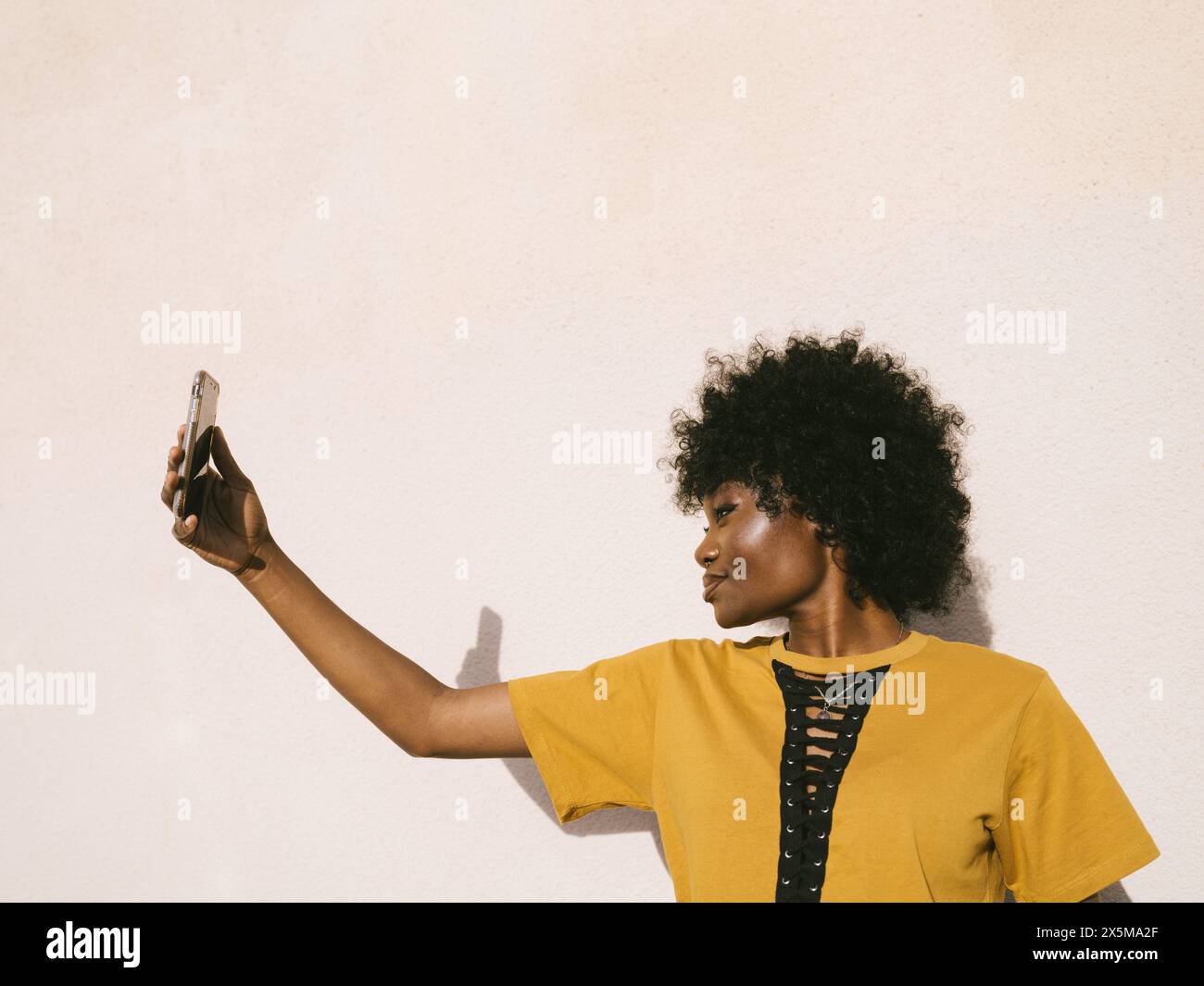 Young woman taking selfie Stock Photo