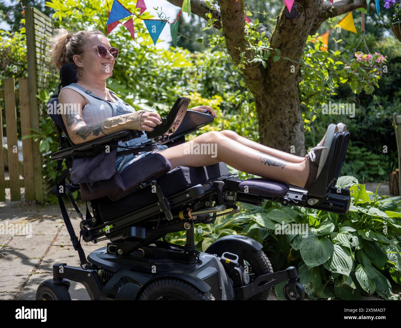 Electric wheelchair woman hi-res stock photography and images - Page 2 -  Alamy