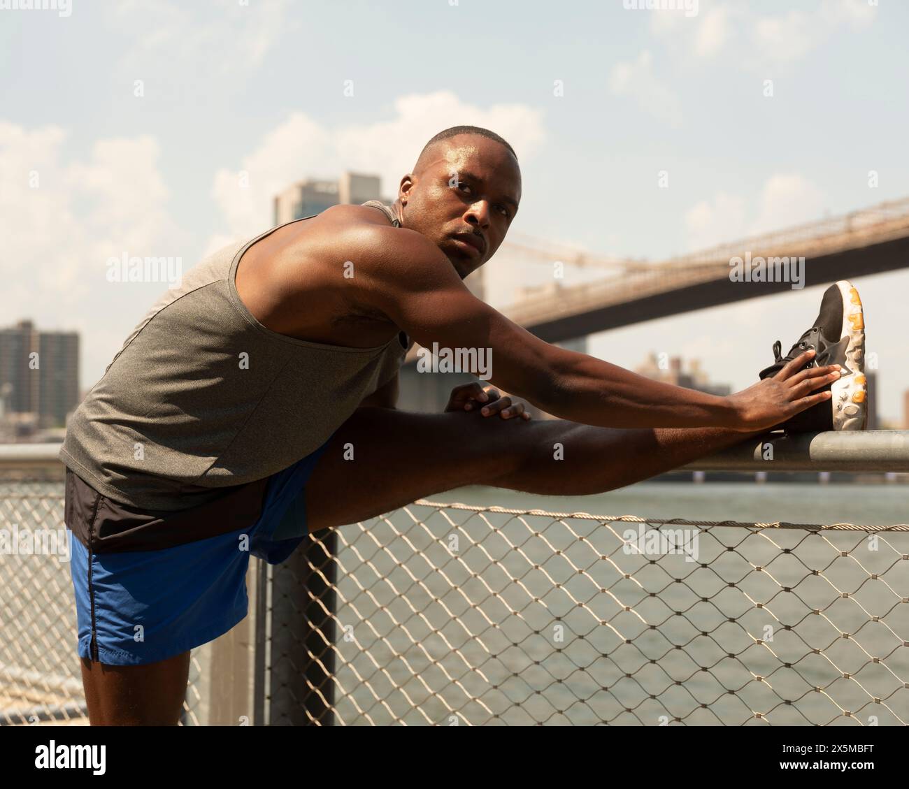Man stretching leg hi-res stock photography and images - Alamy