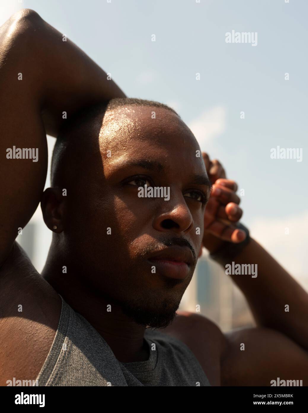 Man stretching arms up african hi-res stock photography and images - Alamy