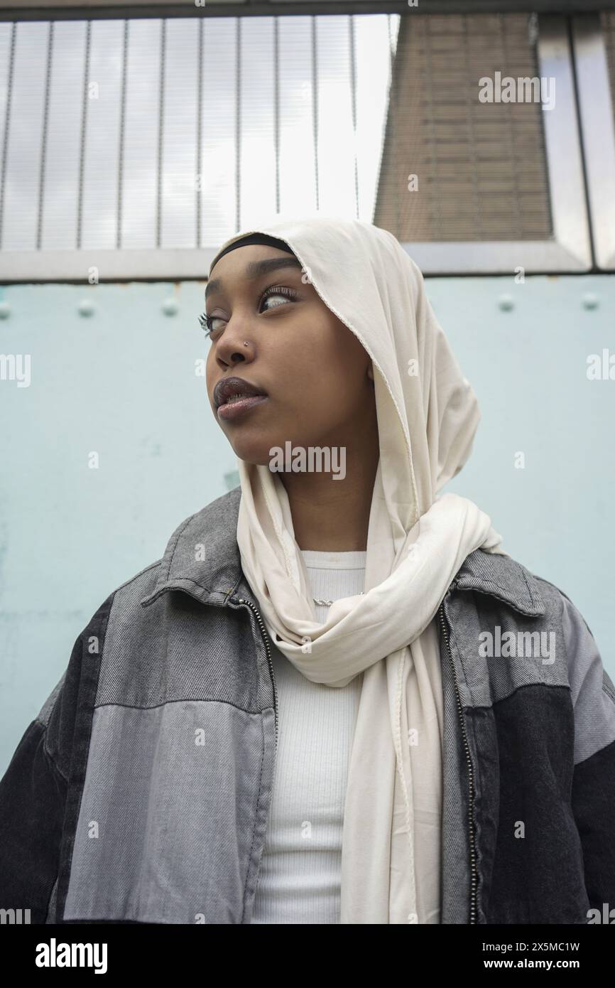 Woman in hijab jacket hi-res stock photography and images - Alamy