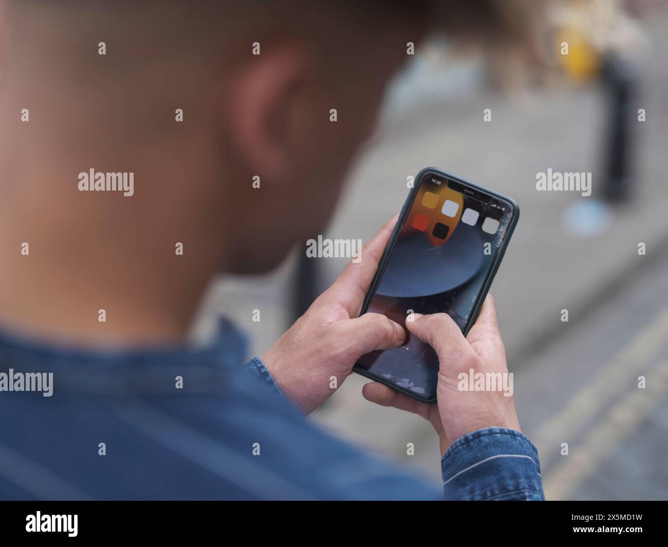 Young man using smart phone Stock Photo