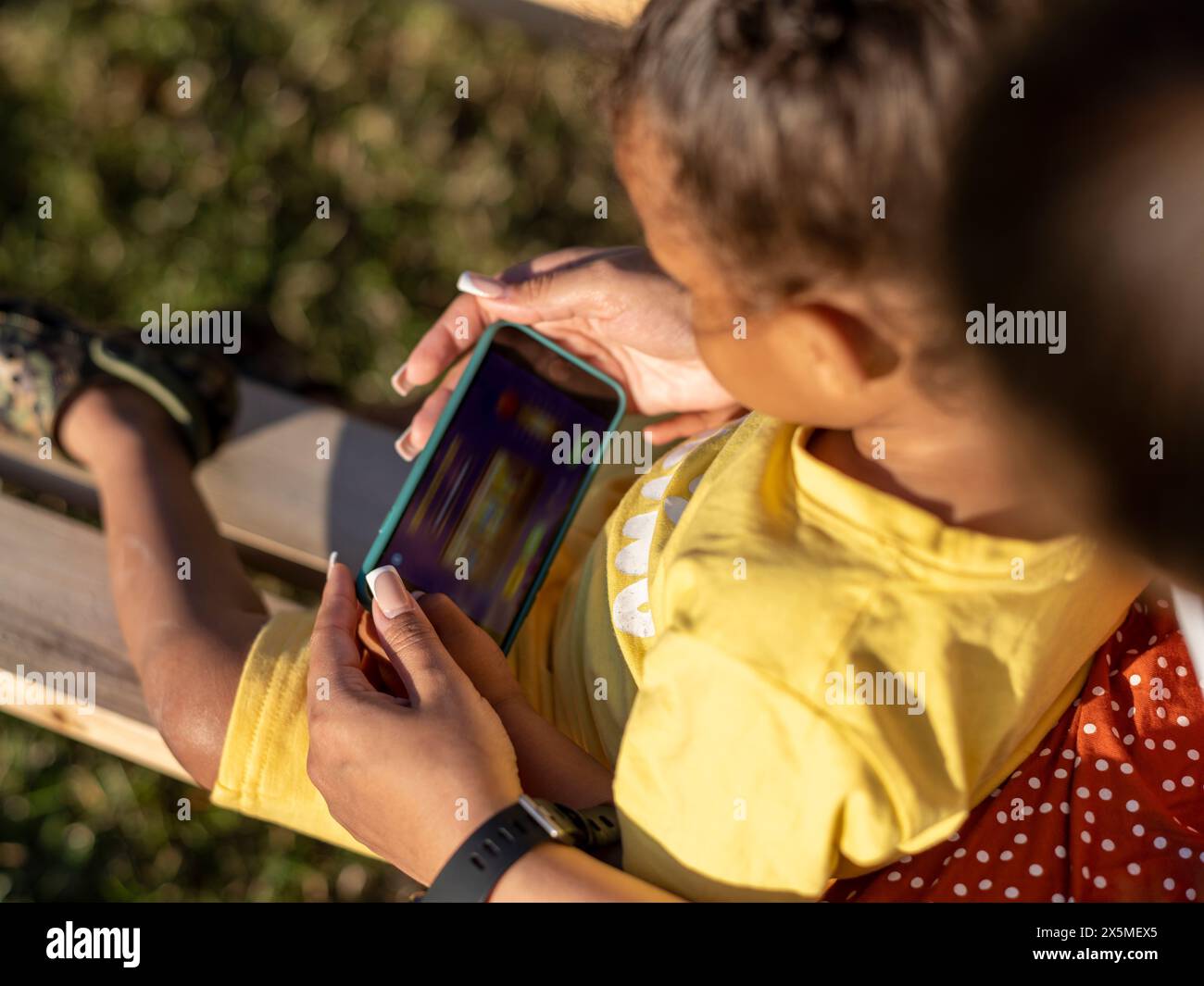 mother-and-son-2-3-using-smart-phone-stock-photo-alamy