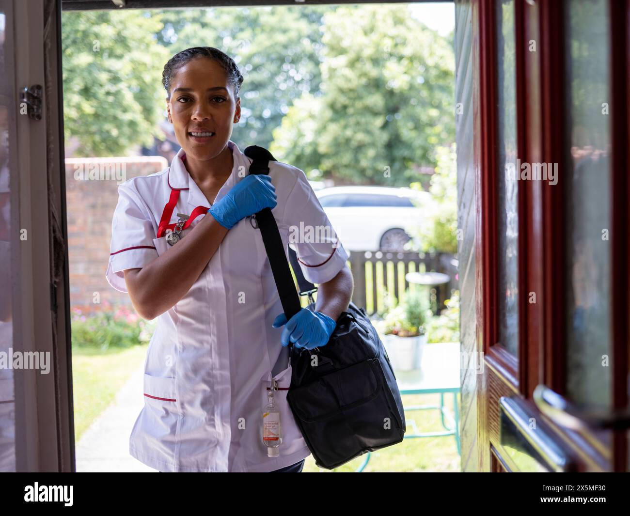Woman nurse standing in hi-res stock photography and images - Alamy