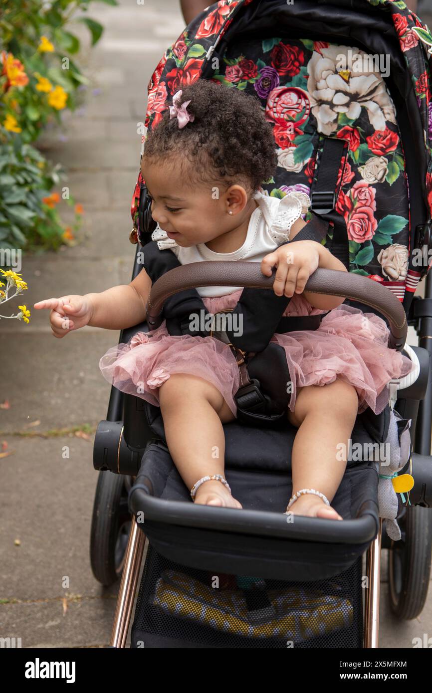 Girl in baby stroller hi-res stock photography and images - Alamy