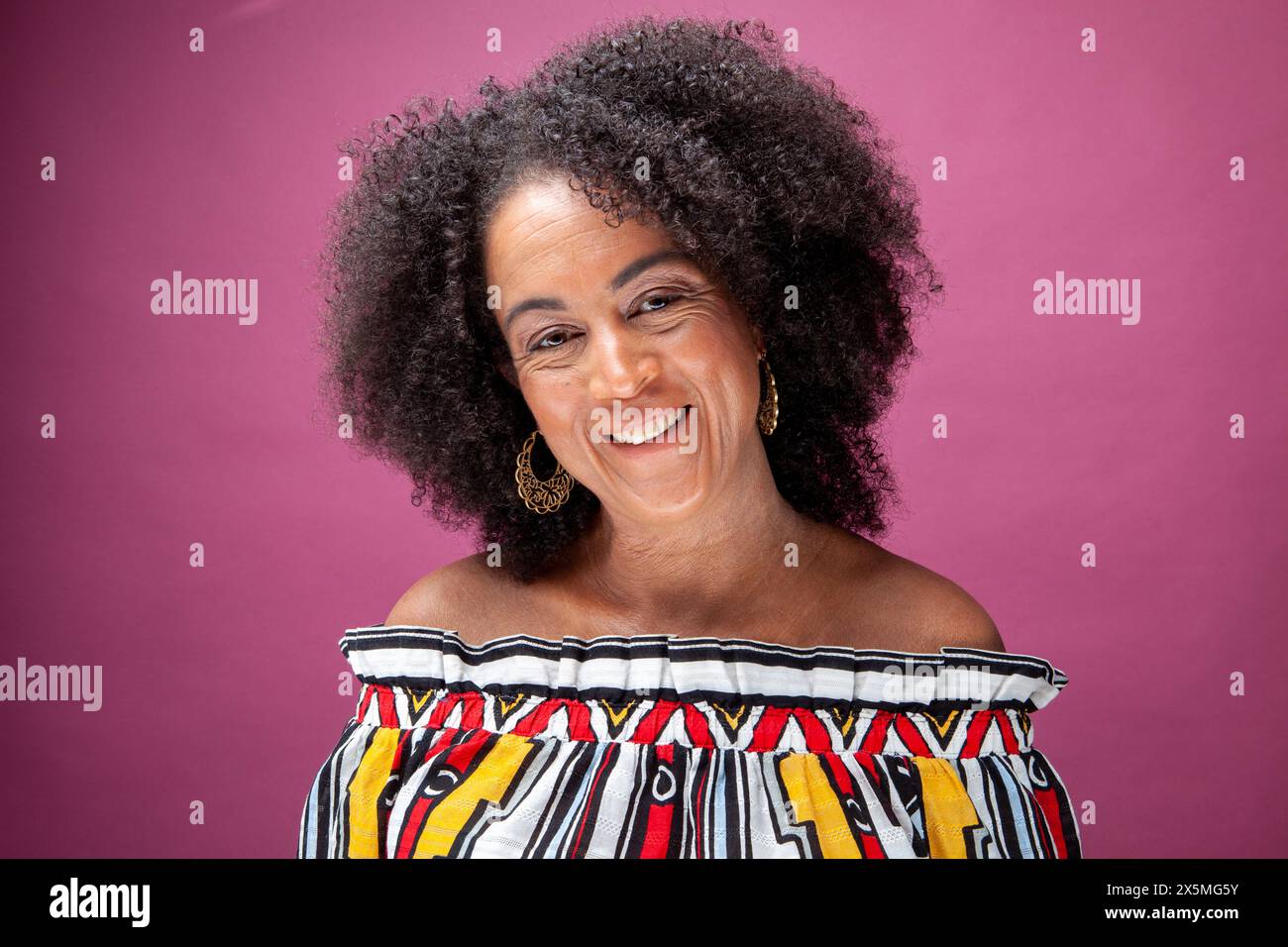 Smiling mature woman studio hi-res stock photography and images - Alamy