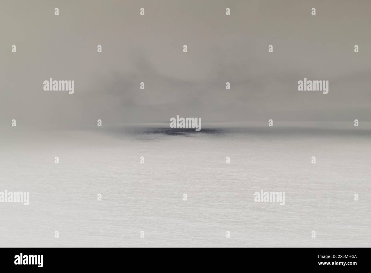 Abstract of clearing storm over vast ocean at dusk, Oregon Stock Photo