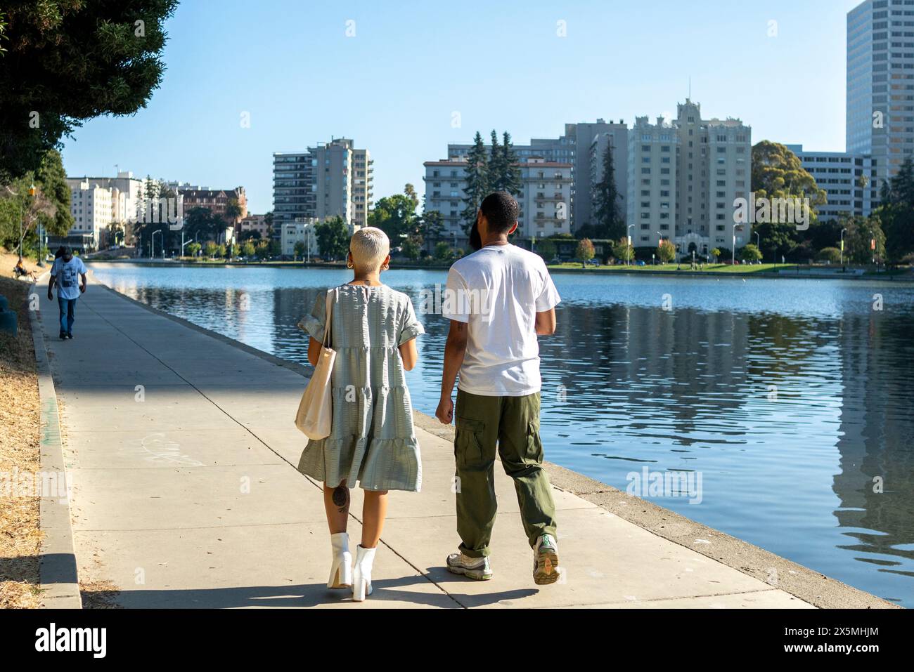 Rear view stylish man walking hi-res stock photography and images - Alamy