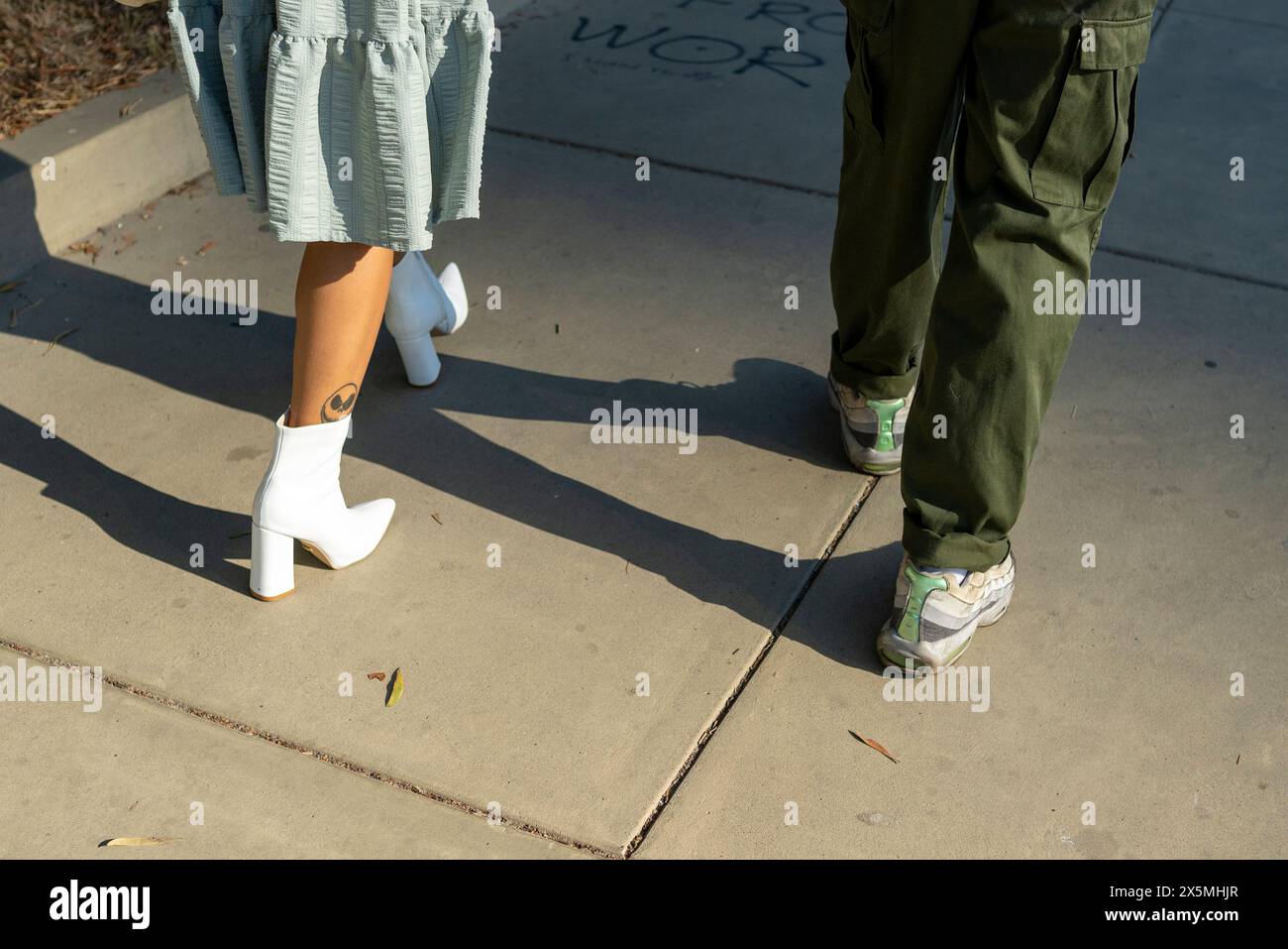 Woman walking high angle hi-res stock photography and images - Alamy