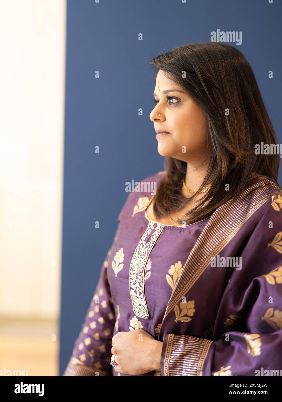 Indian woman wearing jewelry hi-res stock photography and images - Alamy