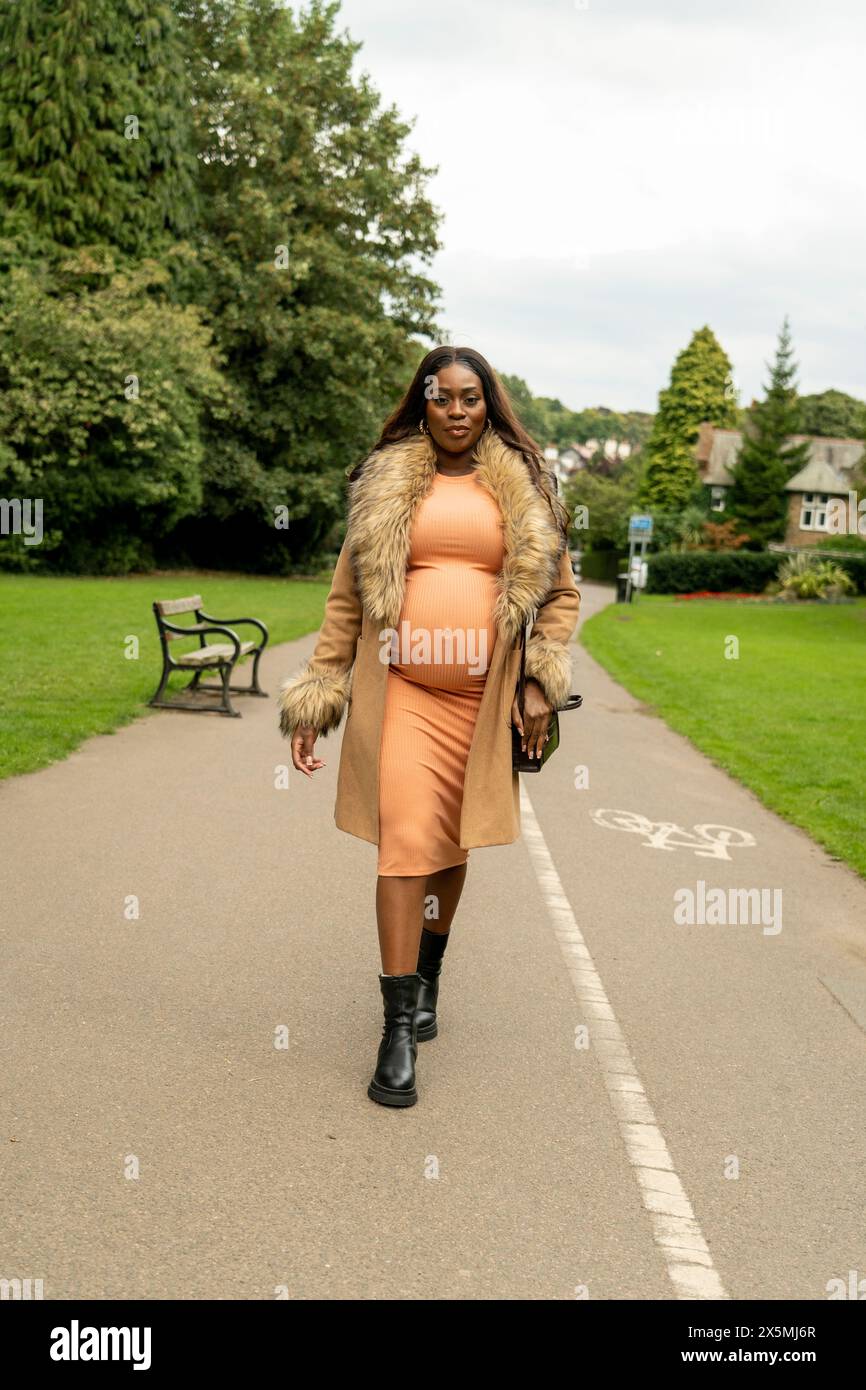 African pregnant woman walking hi-res stock photography and images - Alamy