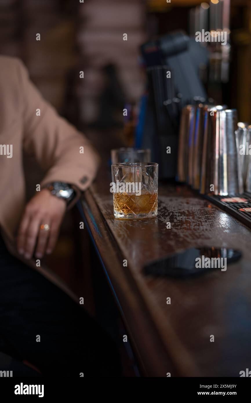 Glass whiskey man in bar hi-res stock photography and images - Alamy