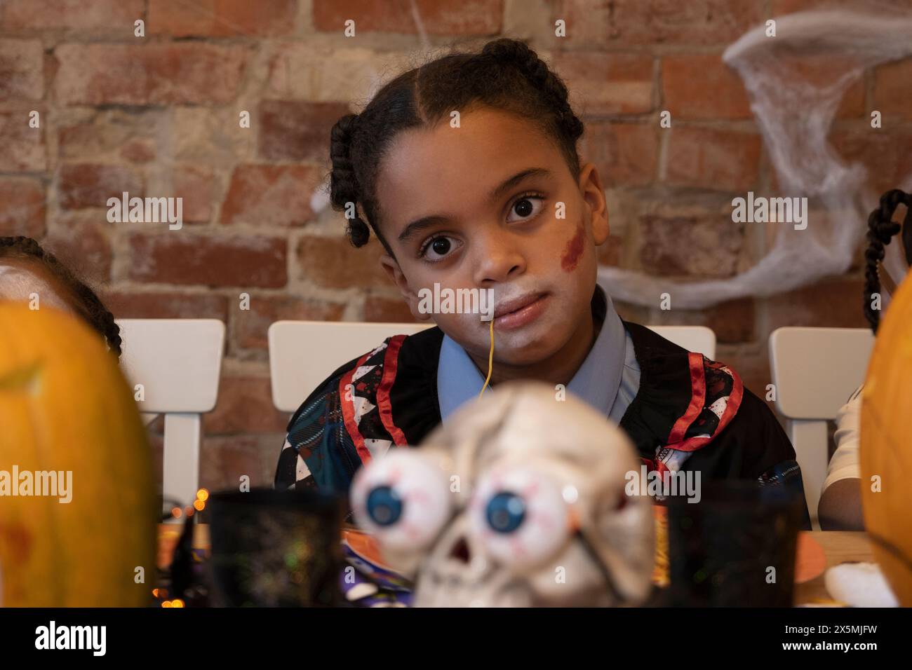 Portrait of boy at Halloween party Stock Photo