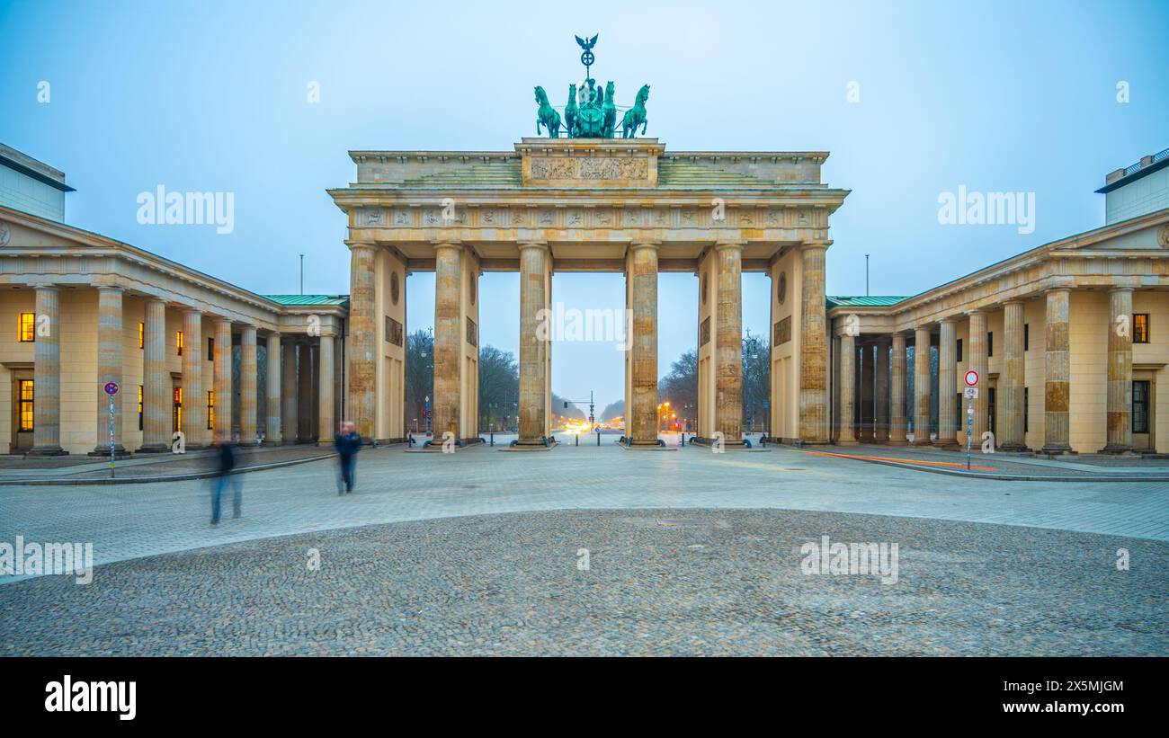Twilight descends on Brandenburg Gate, with soft lighting illuminating ...