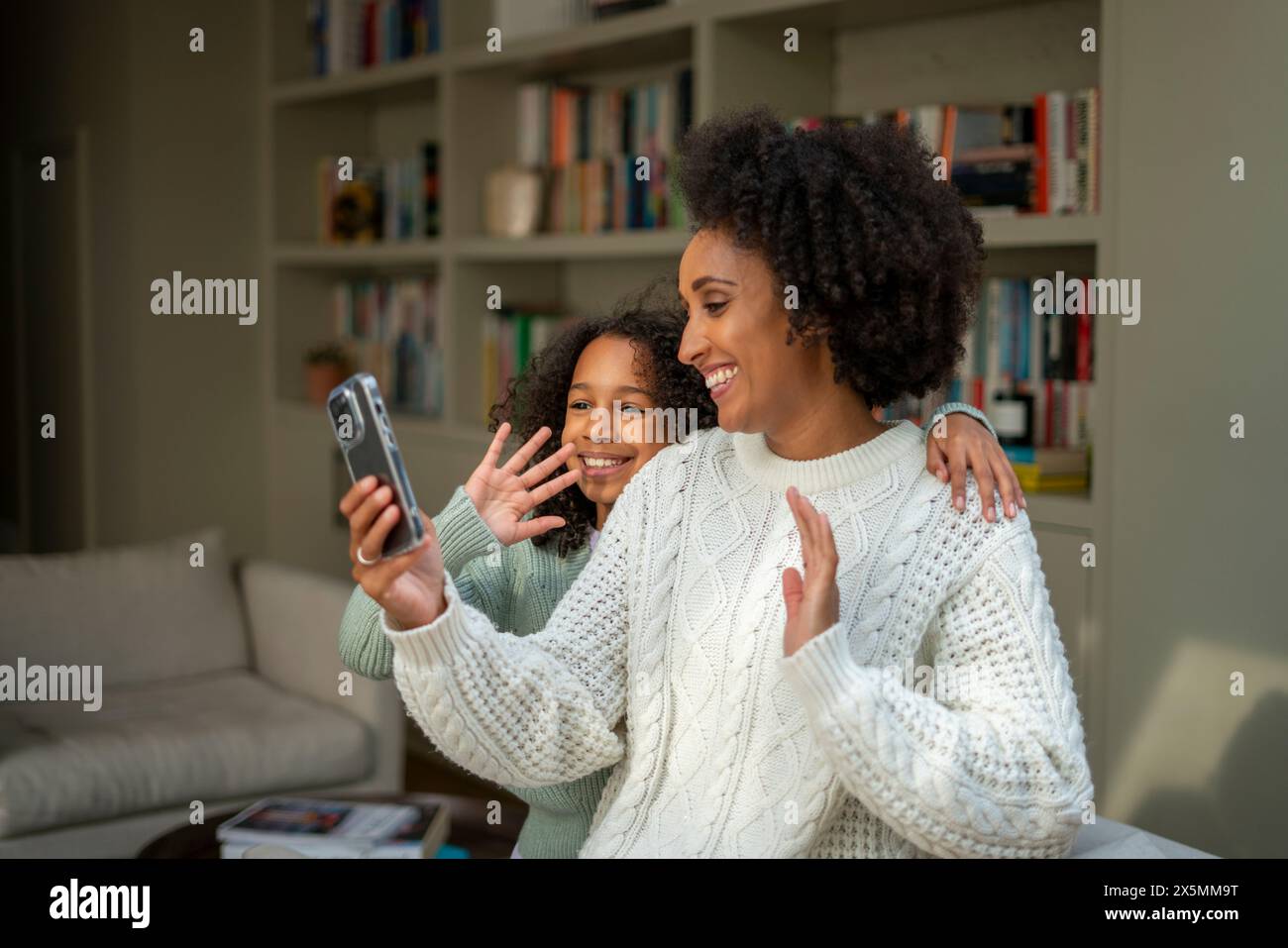 Daughter mother having video call hi-res stock photography and images ...