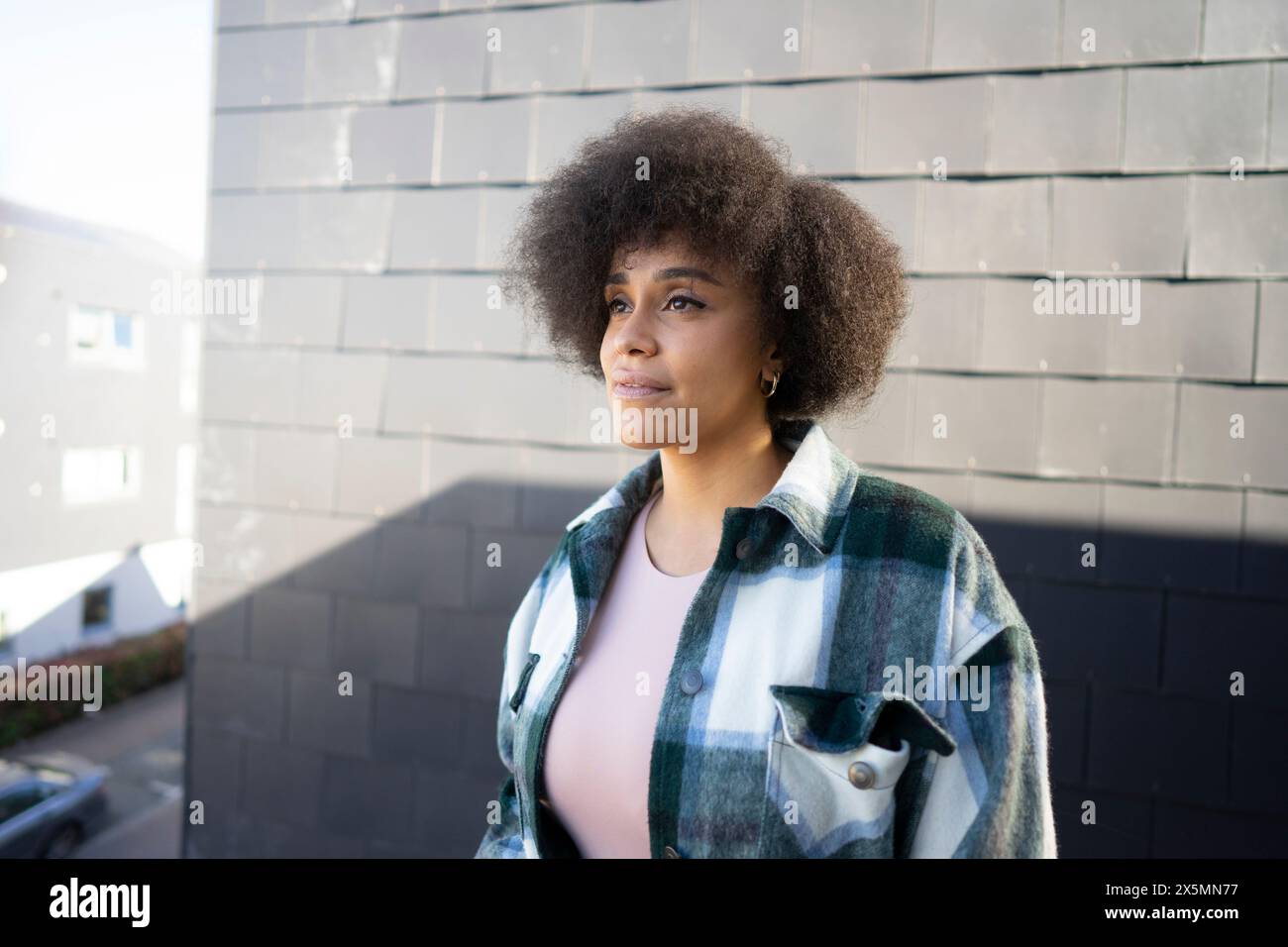 Person in plaid shirt hi-res stock photography and images - Alamy