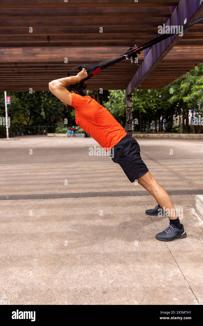 Man exercising in park Stock Photo