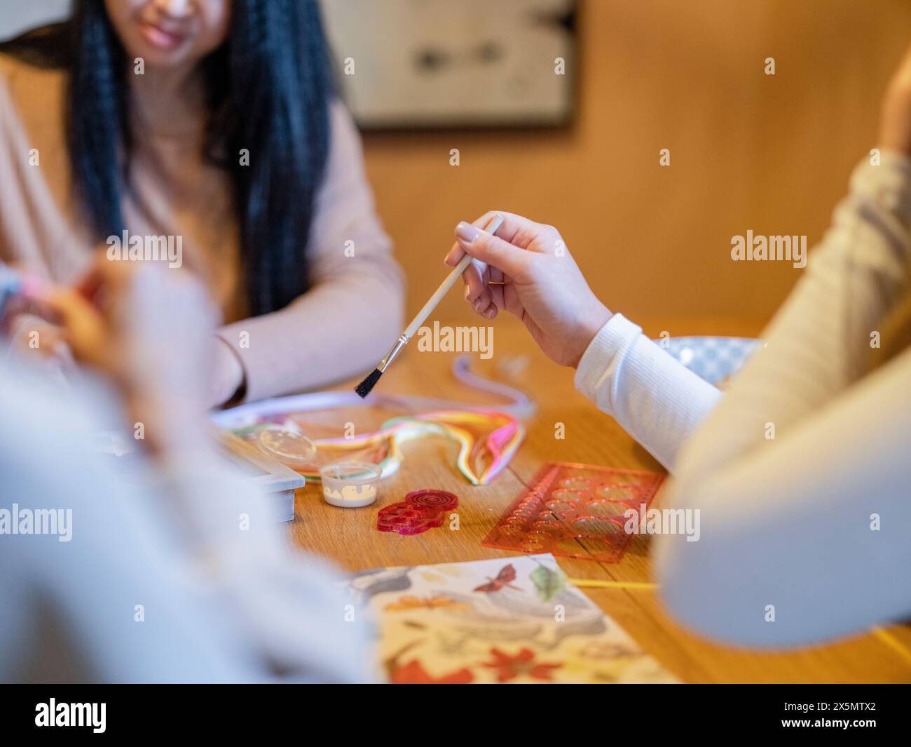 Women painting hi-res stock photography and images - Alamy