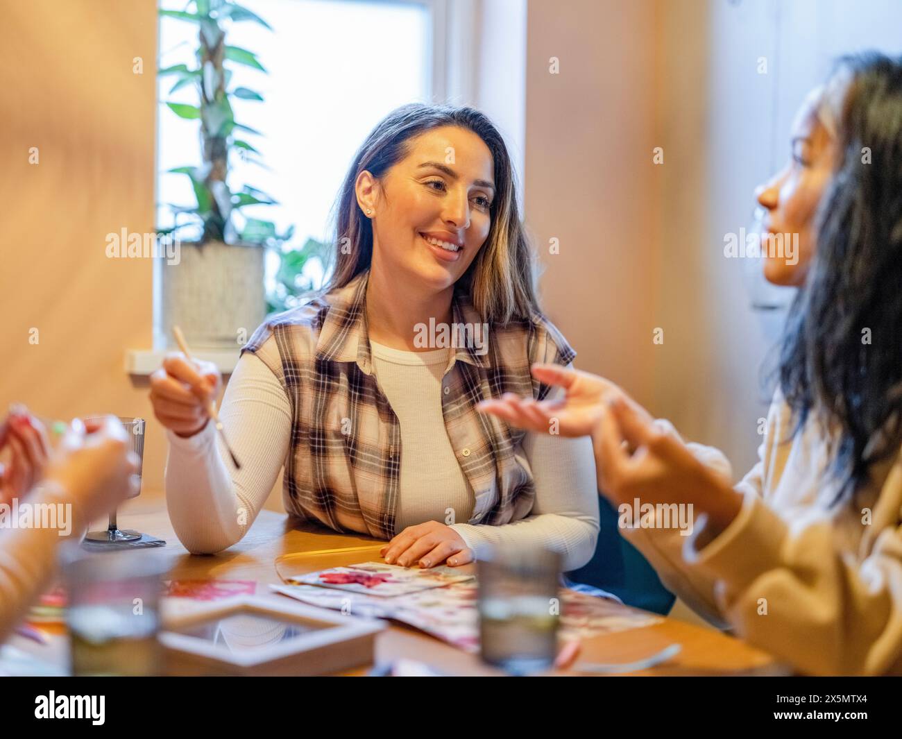 Women talking painting hi-res stock photography and images - Alamy