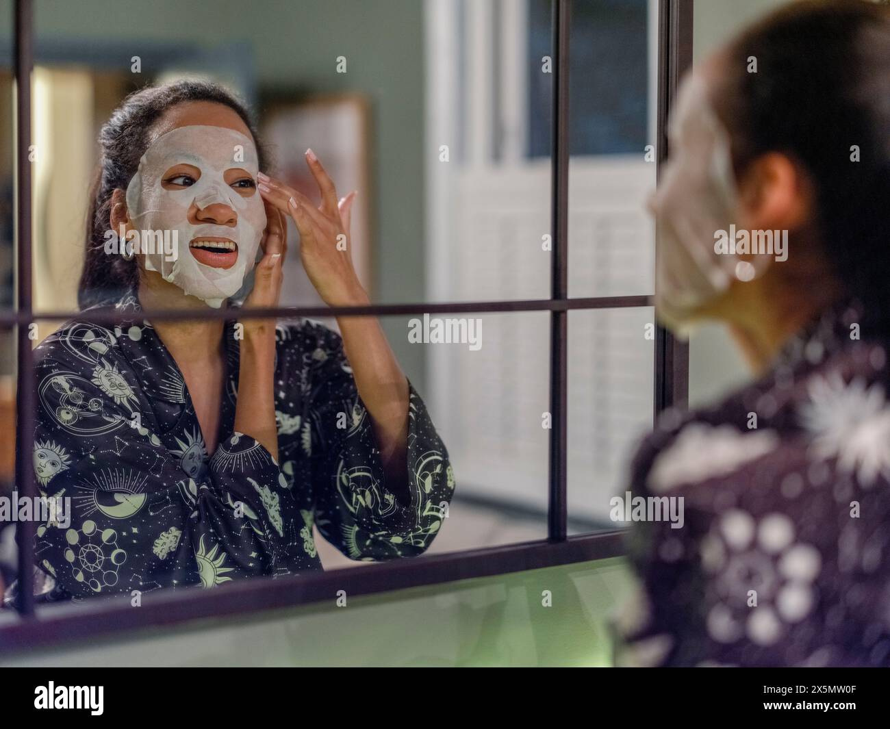Applying face mask hi-res stock photography and images - Alamy