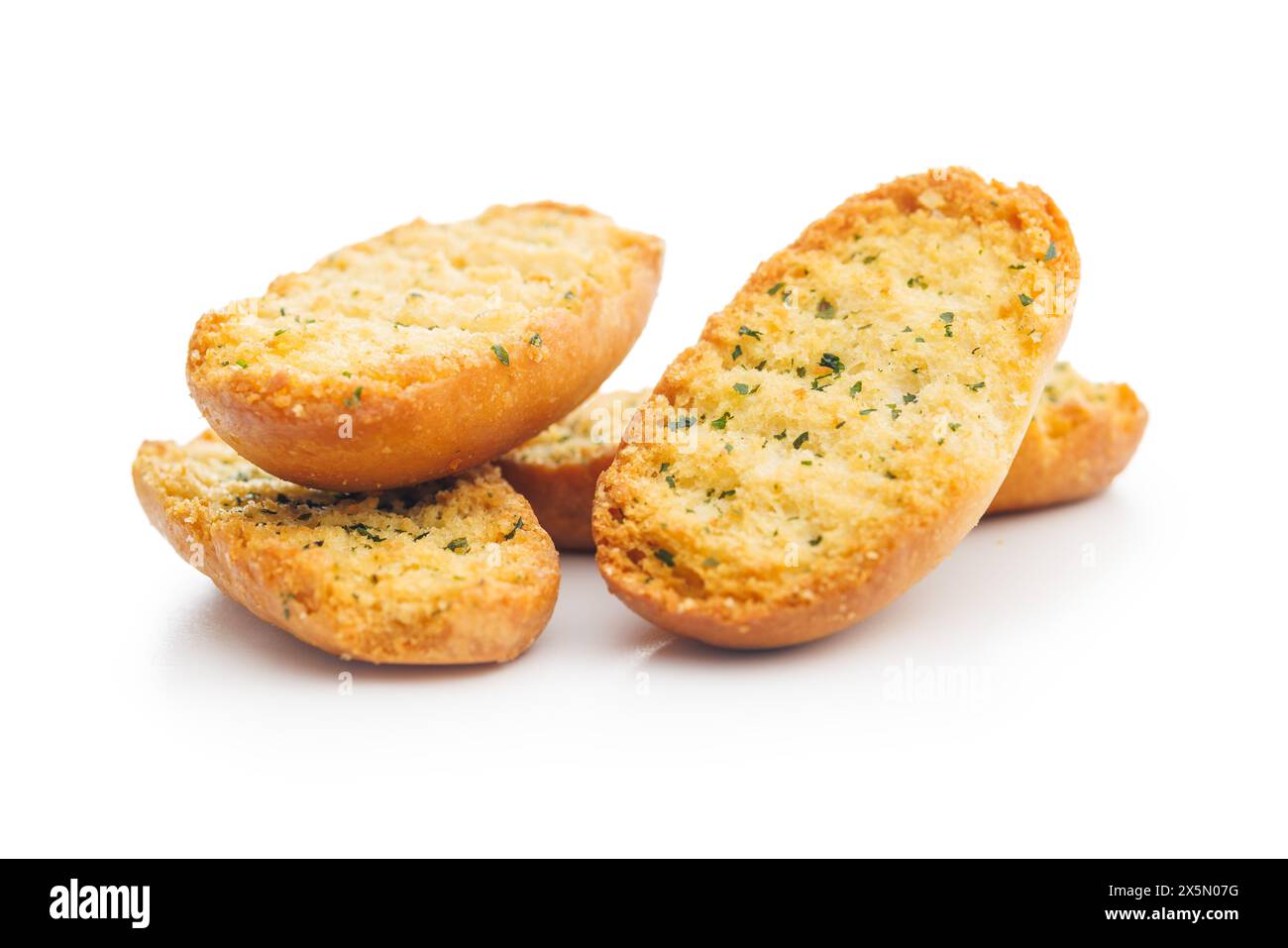 Garlic crisp bread Slices Topped With Herbs isolated on a white background. Stock Photo