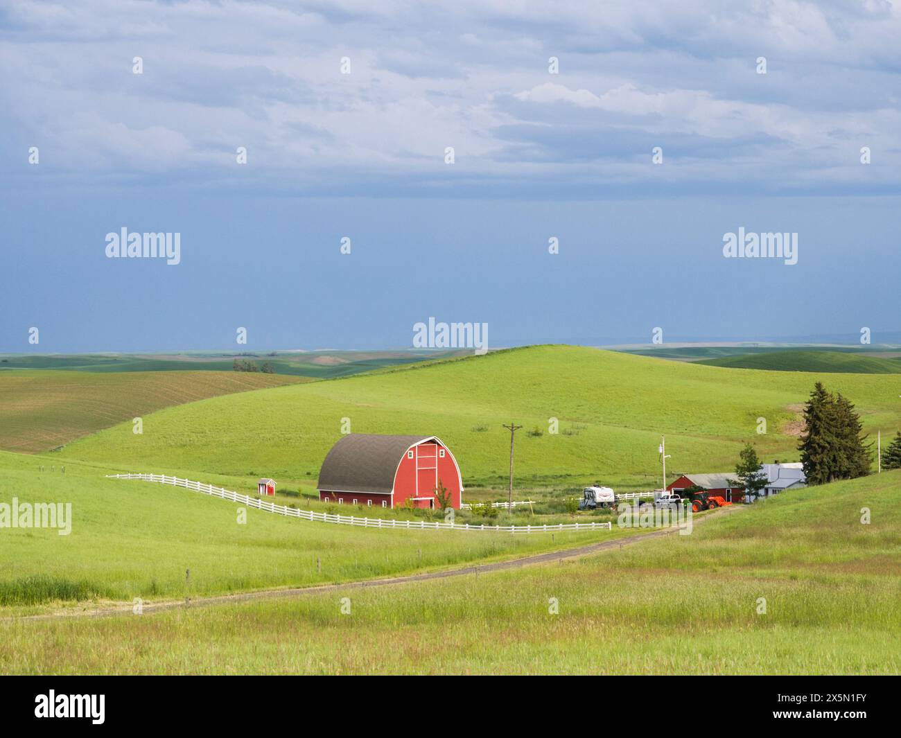 USA, Idaho, Palouse. Beautiful red barn on a farm in the Palouse. (Editorial Use Only) Stock Photo