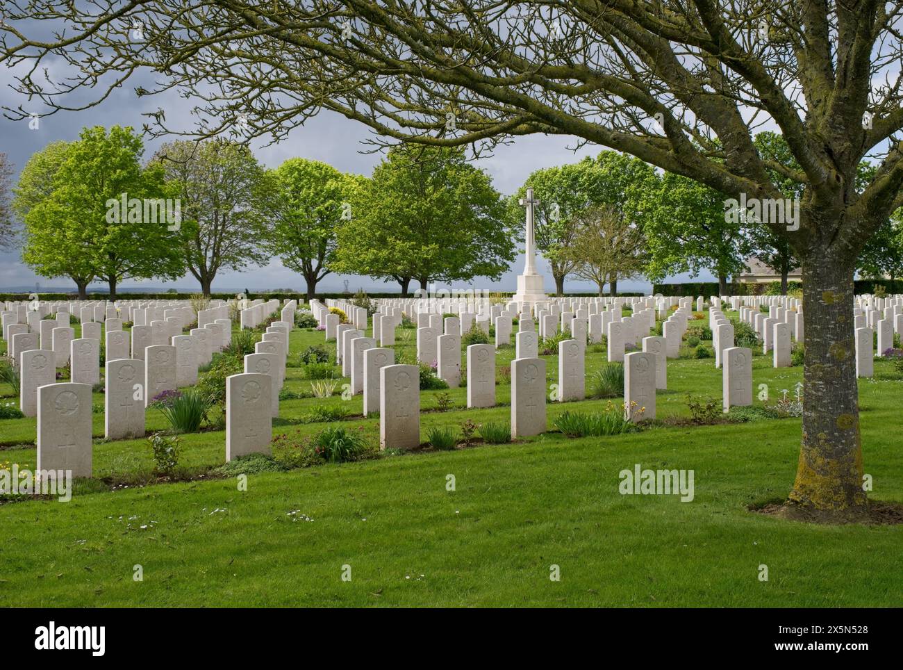 Cintheaux, France - May 6, 2024: This War Cemetery at Bretteville-sur-Laize contains the graves of about 3000 Commonwealth soldiers killed during Seco Stock Photo