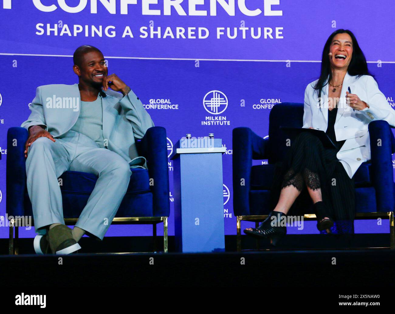 Beverly Hills, CA C May 8th, 2024 C Usher smiles and Lisa Ling laughs