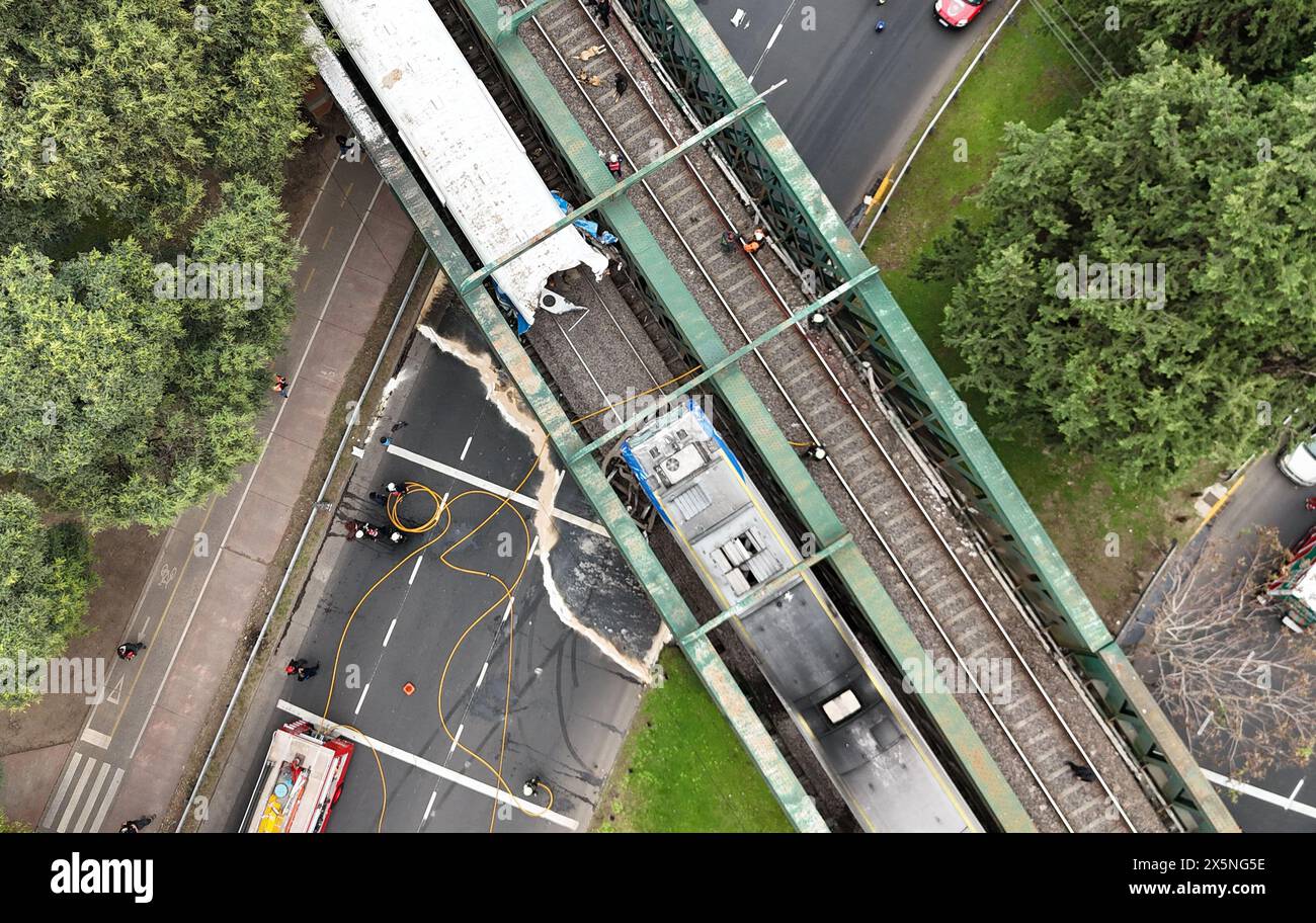 Buenos Aires. 10th May, 2024. An aerial photo taken on May 10, 2024 shows  the scene of a train accident on a bridge in Buenos Aires, Argentina. At  least 30 people were