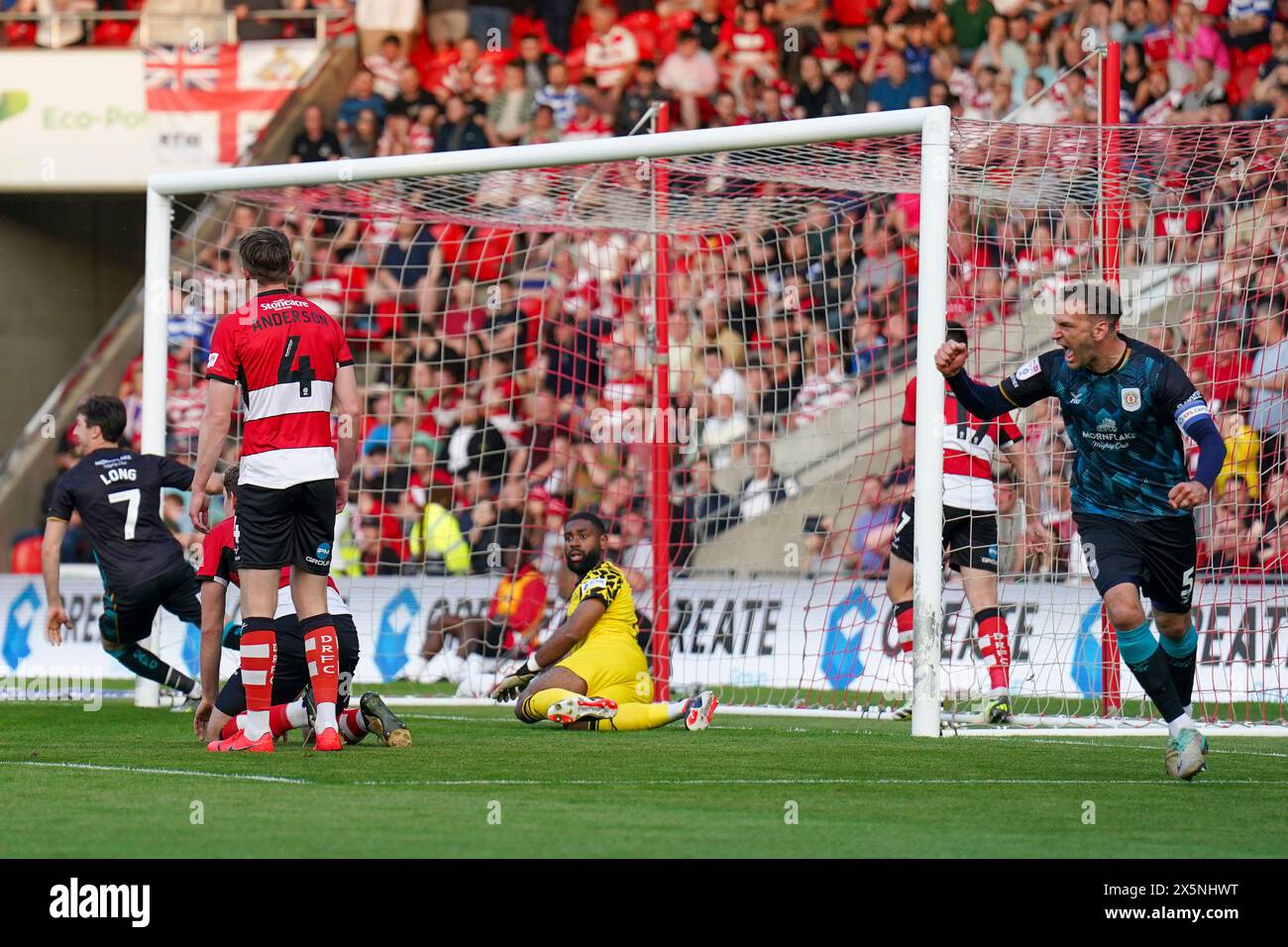 Crewe Alexandra defender Mickey Demetriou (5) scores a GOAL 01 and