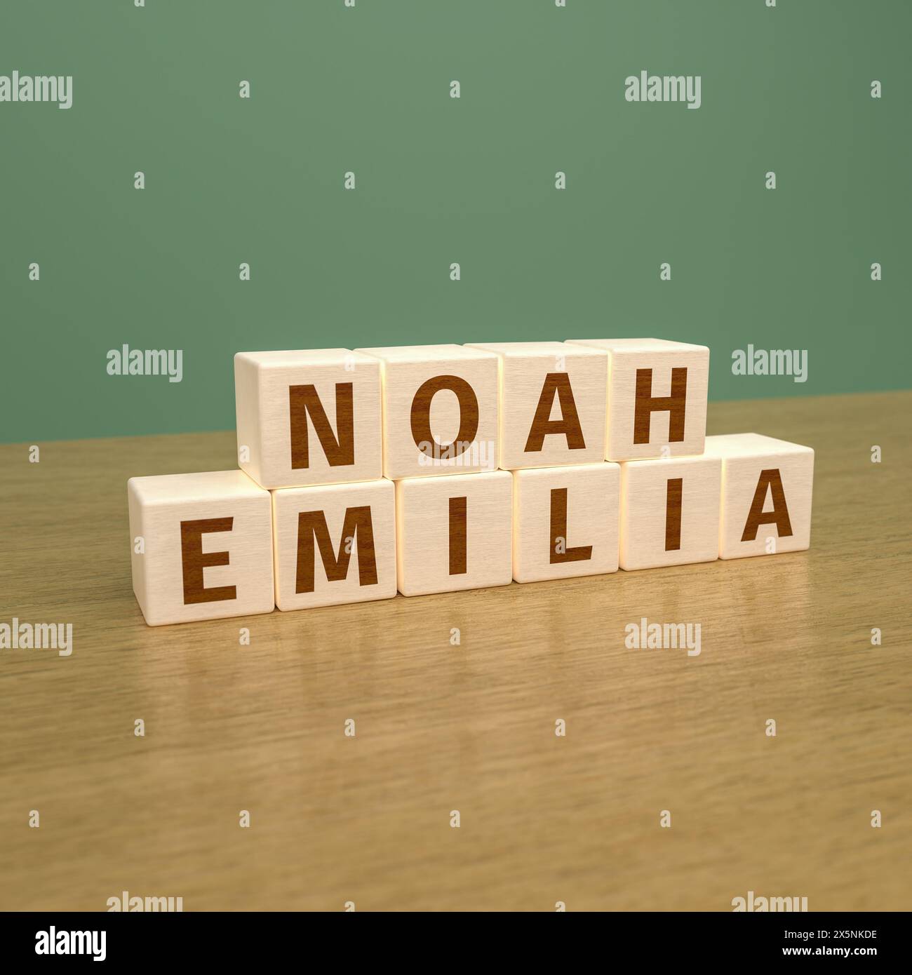The most popular first names for babies in Germany were in 2022 and 2023 Noah for boys and Emilia for girls: the names written with wood cubes. Stock Photo