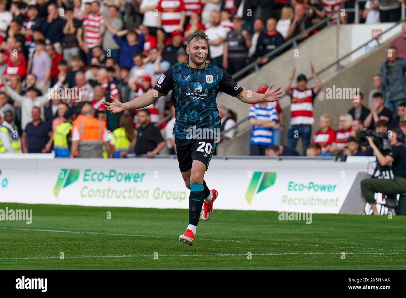 Crewe Alexandra forward Elliott Nevitt (20) celebrates Doncaster Rovers
