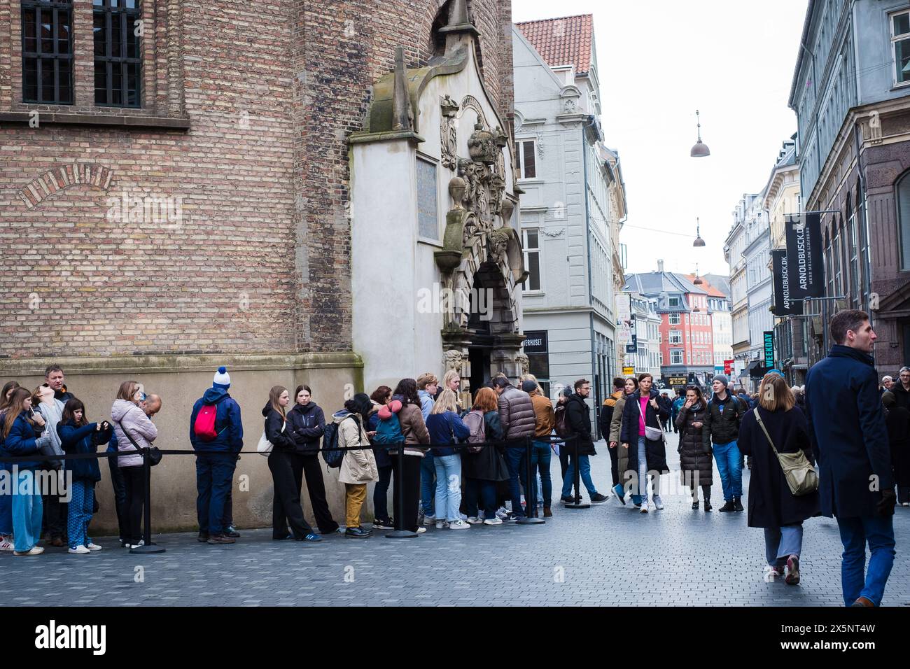 Copenhagen, Denmark - April 6, 2024: People waiting in line to enter The Round Tower. Stock Photo