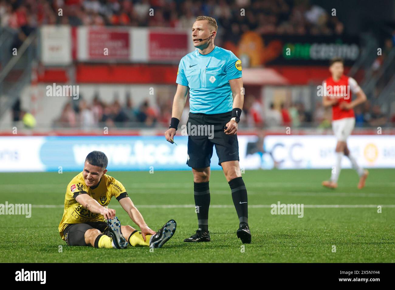 MAY 10 Referee Martijn Vos shows the yellow card for Diego van