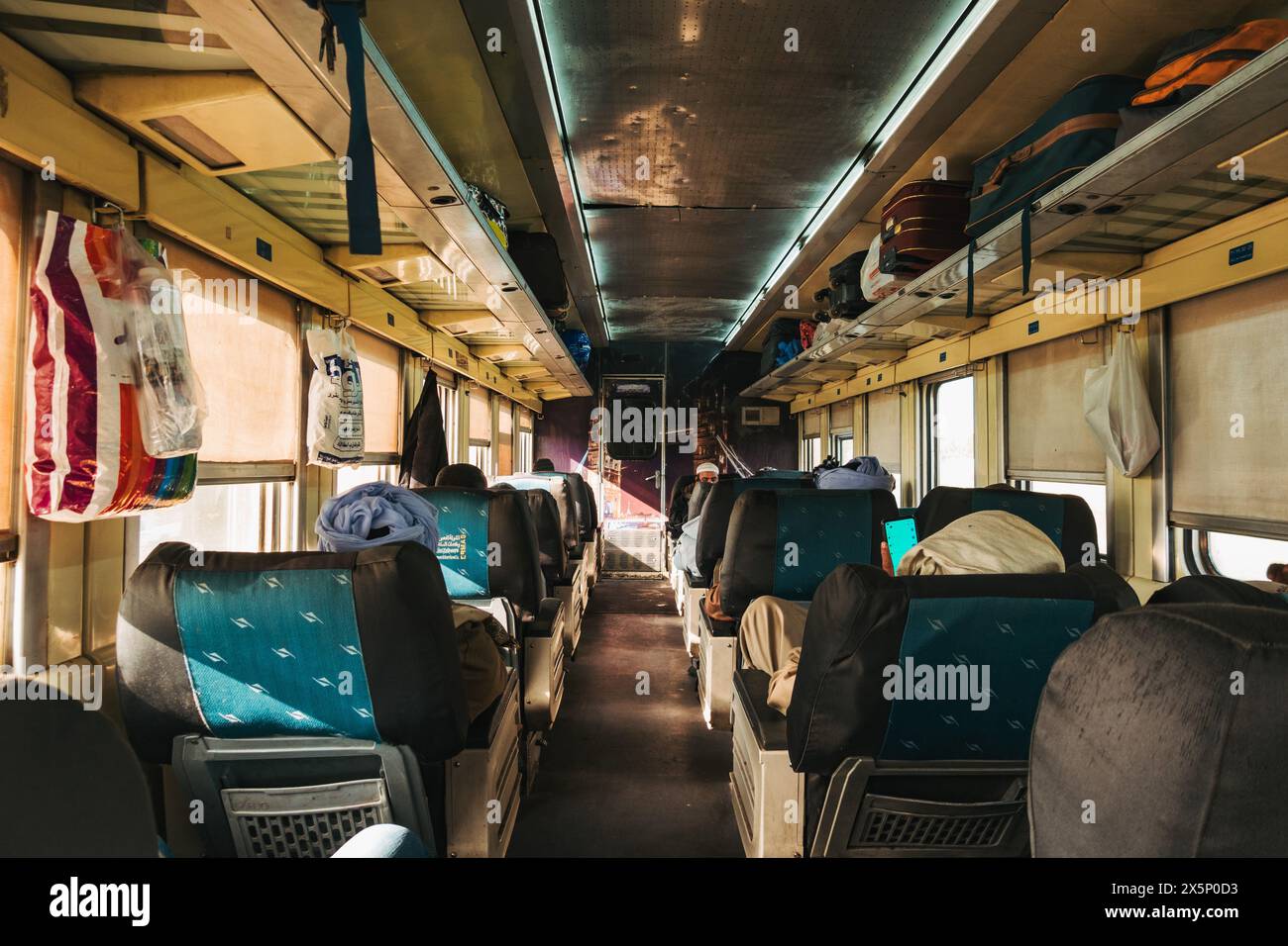 The interior of an Egyptian Railways train riding in first class in one of the older 'Spanish Express' carraiges Stock Photo