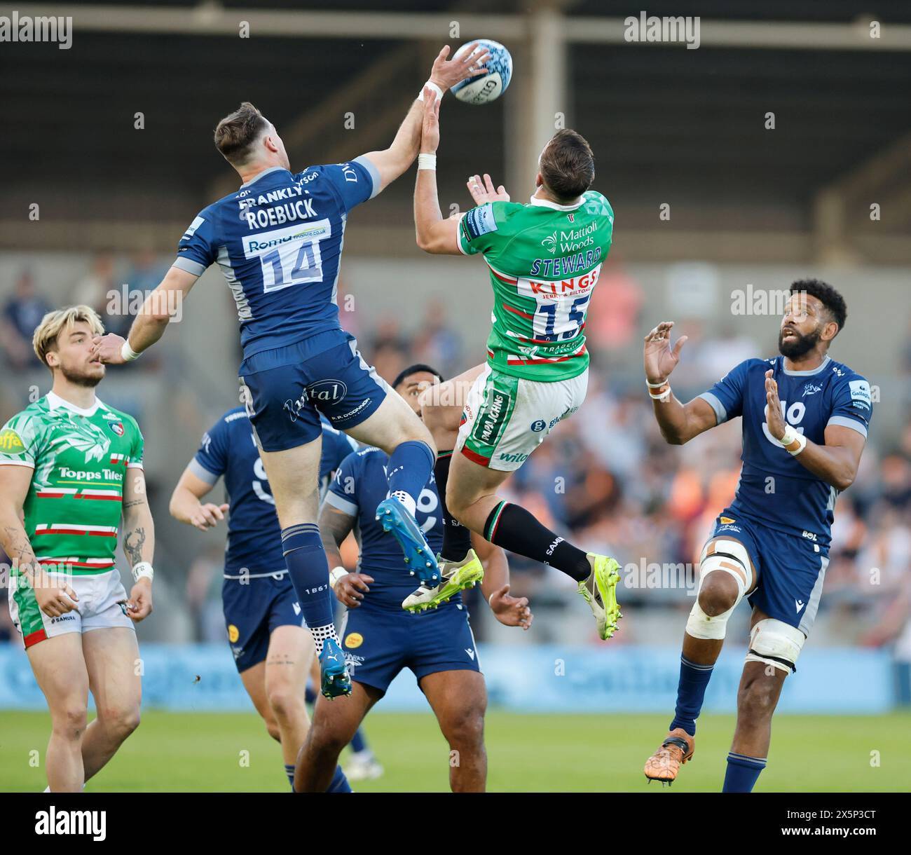 Salford, UK. 10th May, 2024. 10th May 2024; Salford Community Stadium, Salford, Lancashire, England; Gallagher Premiership Rugby, Sale Sharks versus Leicester Tigers;  Tom Roebuck of Sale Sharks and  Freddie Stewart of Leicester Tigers jump for the high ball Credit: Action Plus Sports Images/Alamy Live News Stock Photo